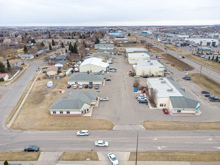 Aerial view of a suburban neighborhood with houses and streets.