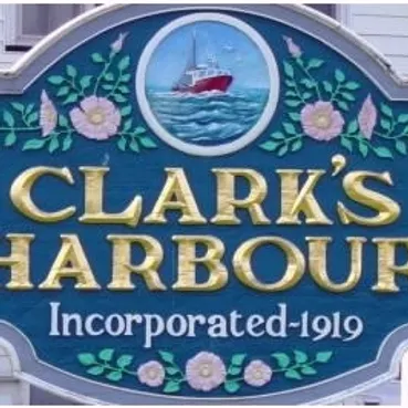 Clark's Harbour sign featuring ship and flowers