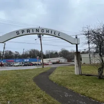 Springhill town entrance arch over pathway