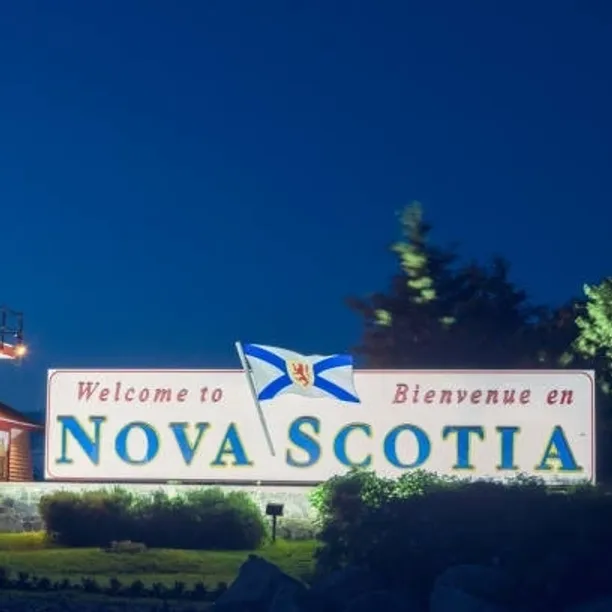 Illuminated "Welcome to Nova Scotia" roadside sign