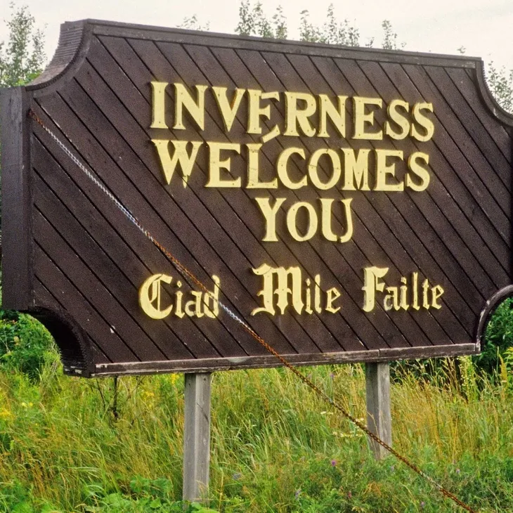 Inverness welcomes you wooden sign