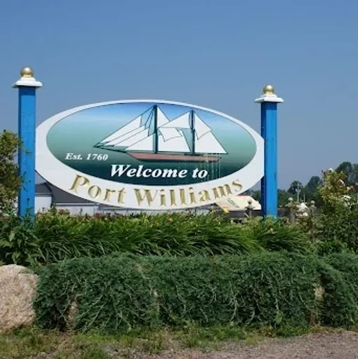 Port Williams welcome sign with sailboat